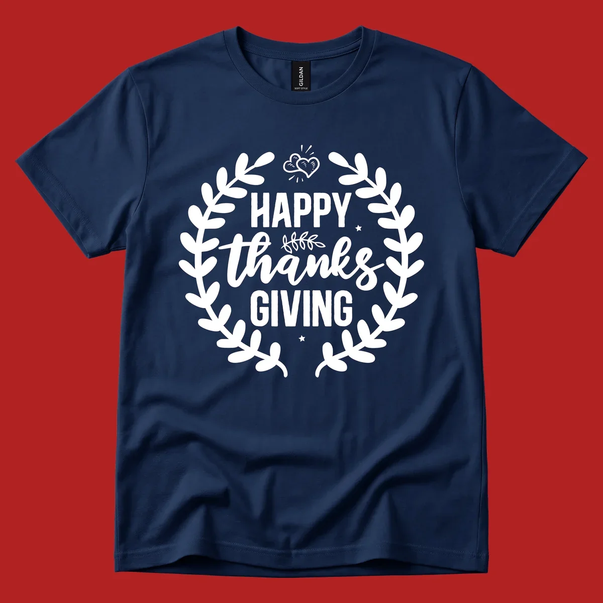 Happy Thanksgiving lettering inside a laurel wreath with hearts and stars.