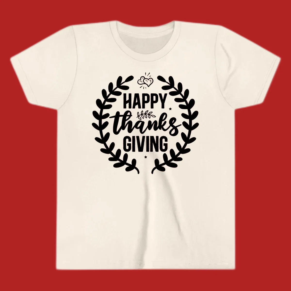 Happy Thanksgiving lettering inside a laurel wreath with hearts and stars.