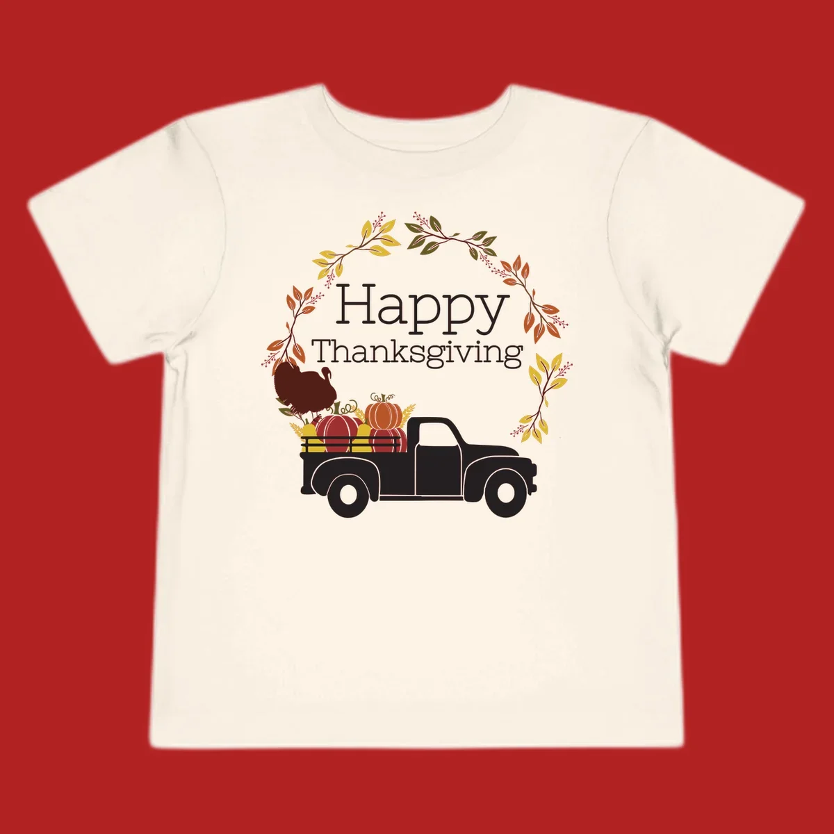 Happy Thanksgiving text with a vintage truck, pumpkins, and fall wreath. Thanksgiving-truck-pumpkins.