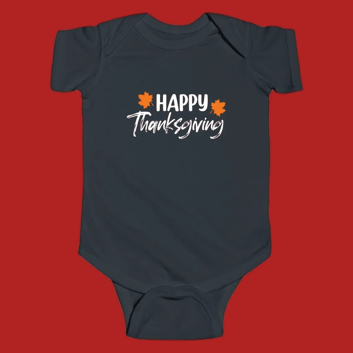 Happy Thanksgiving text with orange maple leaves, holiday design.