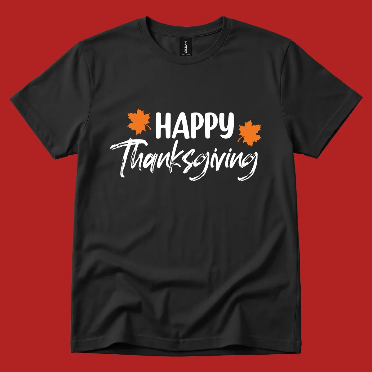 Happy Thanksgiving text with orange maple leaves, holiday design.