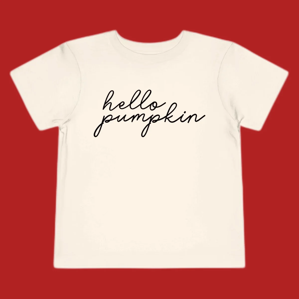 White script text reading 'hello pumpkin' on a black background.