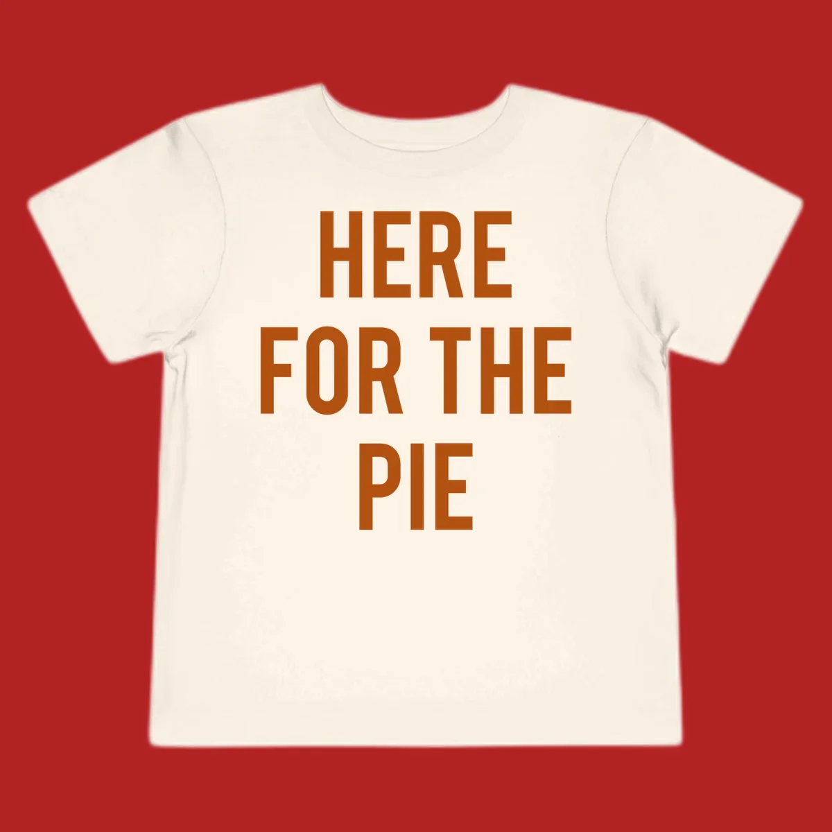 The phrase 'HERE FOR THE PIE' in bold orange lettering against a dark background.