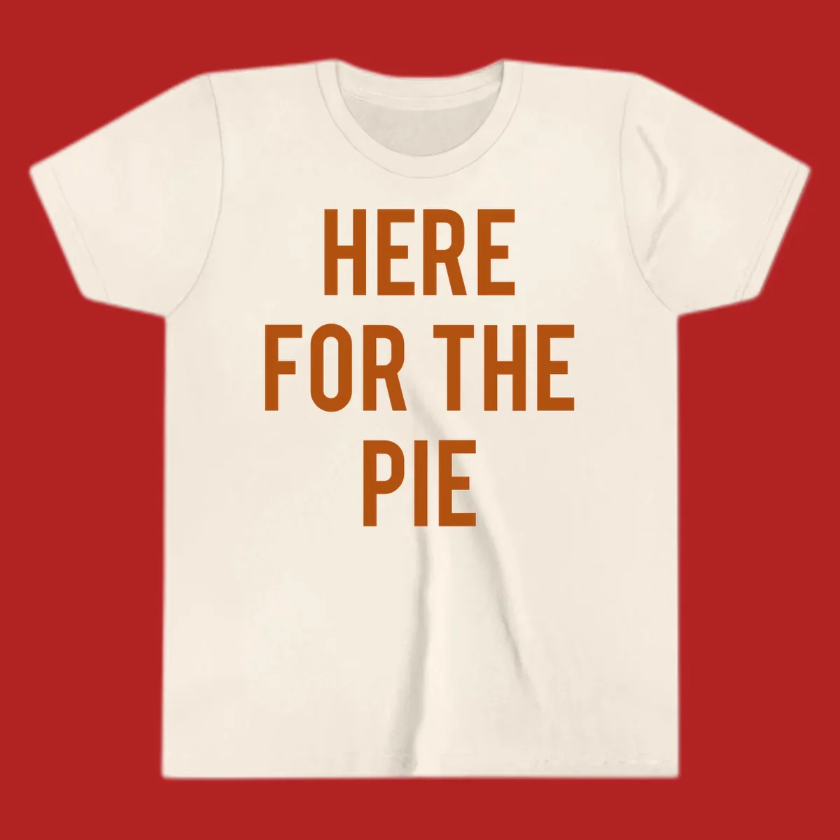 The phrase 'HERE FOR THE PIE' in bold orange lettering against a dark background.
