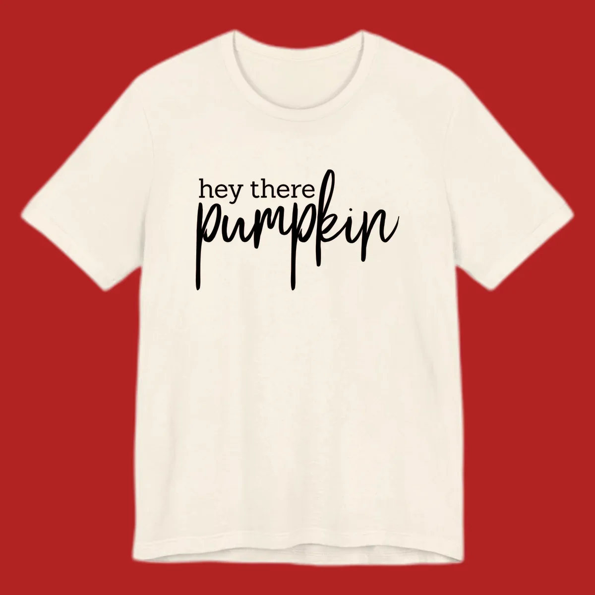 White text design with "hey there" in block font and "pumpkin" in script font, on a black background.