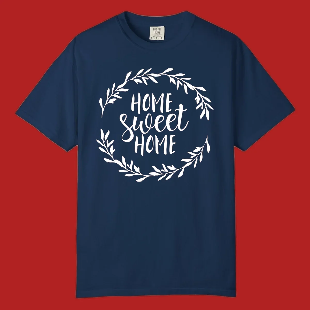 White 'Home Sweet Home' text with a floral wreath on a dark background.