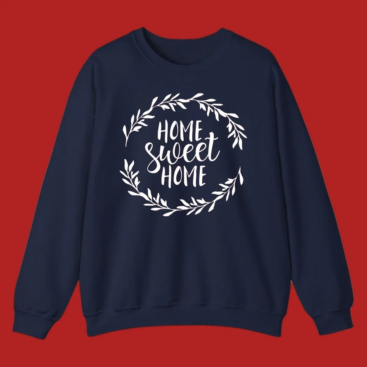 White 'Home Sweet Home' text with a floral wreath on a dark background.