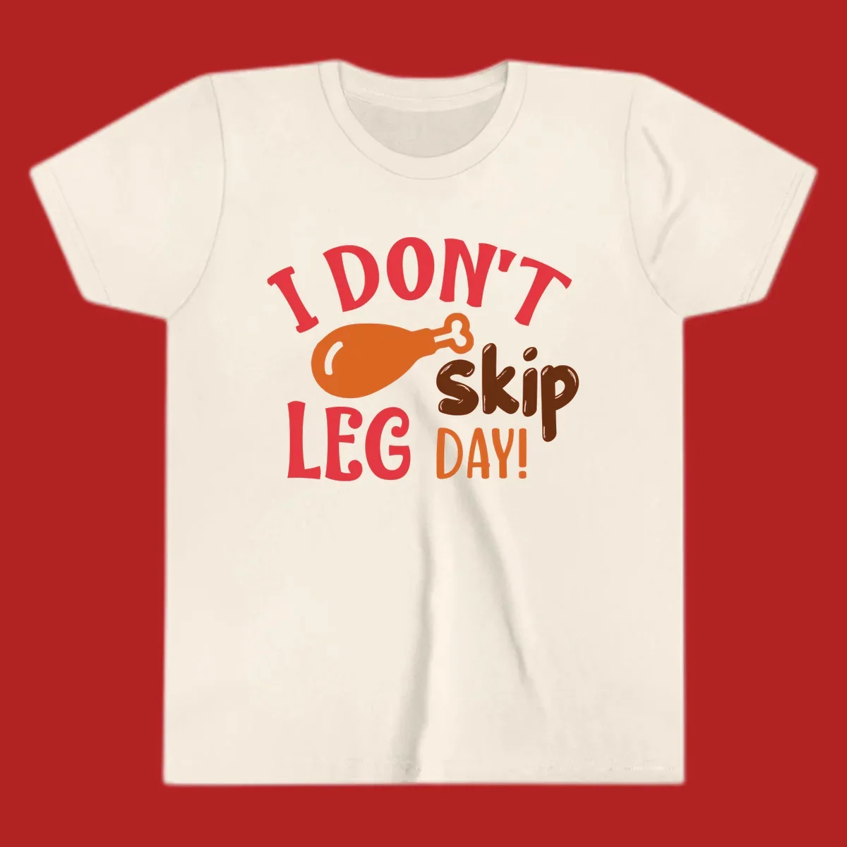 I Don't Skip Leg Day turkey drumstick graphic tee shirt with text.