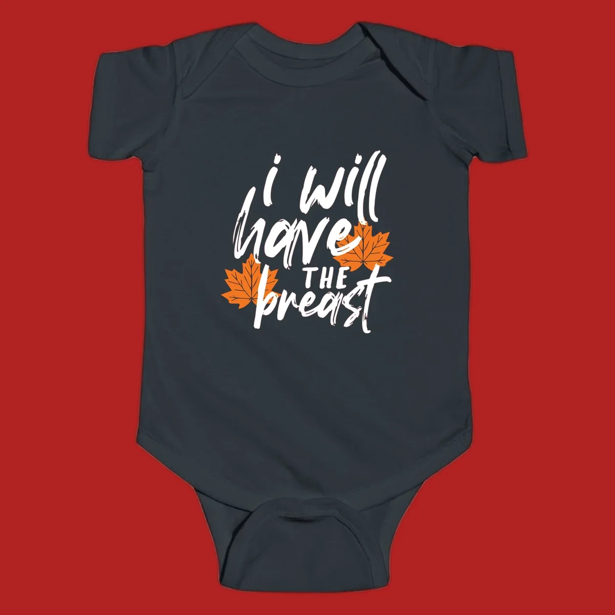 Thanksgiving pun design with text "i will have THE breast" and orange maple leaves.