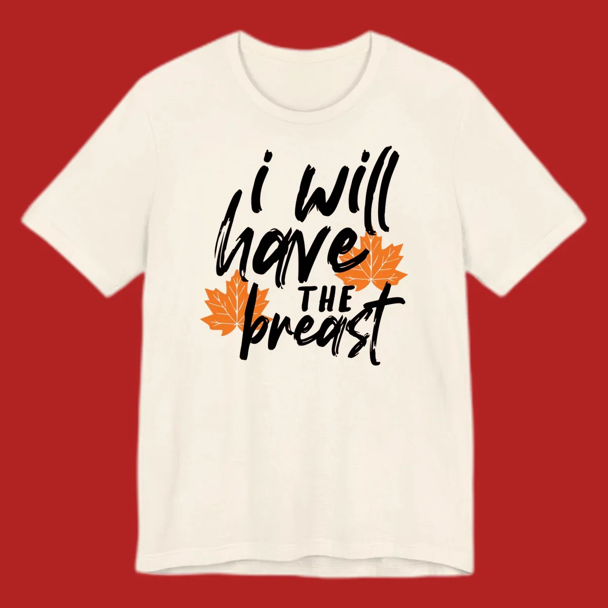 Thanksgiving pun design with text "i will have THE breast" and orange maple leaves.