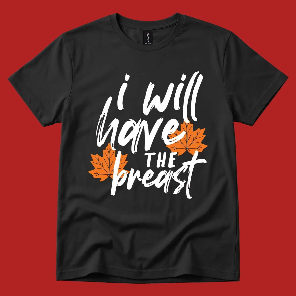 Thanksgiving pun design with text "i will have THE breast" and orange maple leaves.