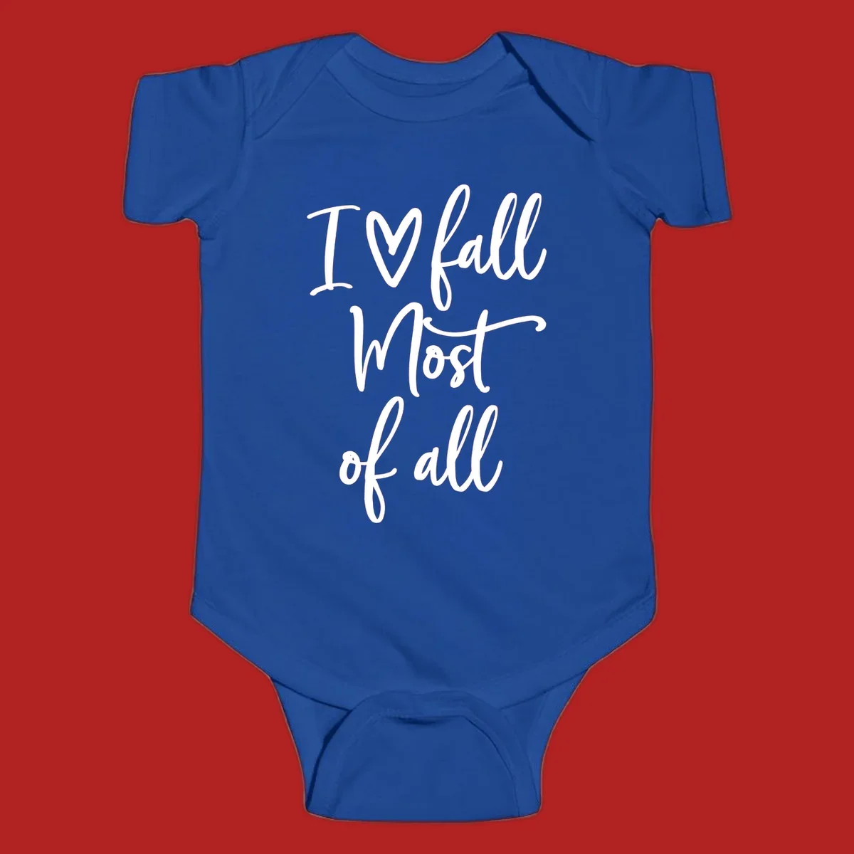 Hand-drawn script text 'I ♡ fall Most of all' in white on a black background.