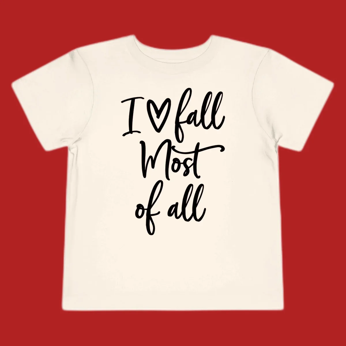Hand-drawn script text 'I ♡ fall Most of all' in white on a black background.
