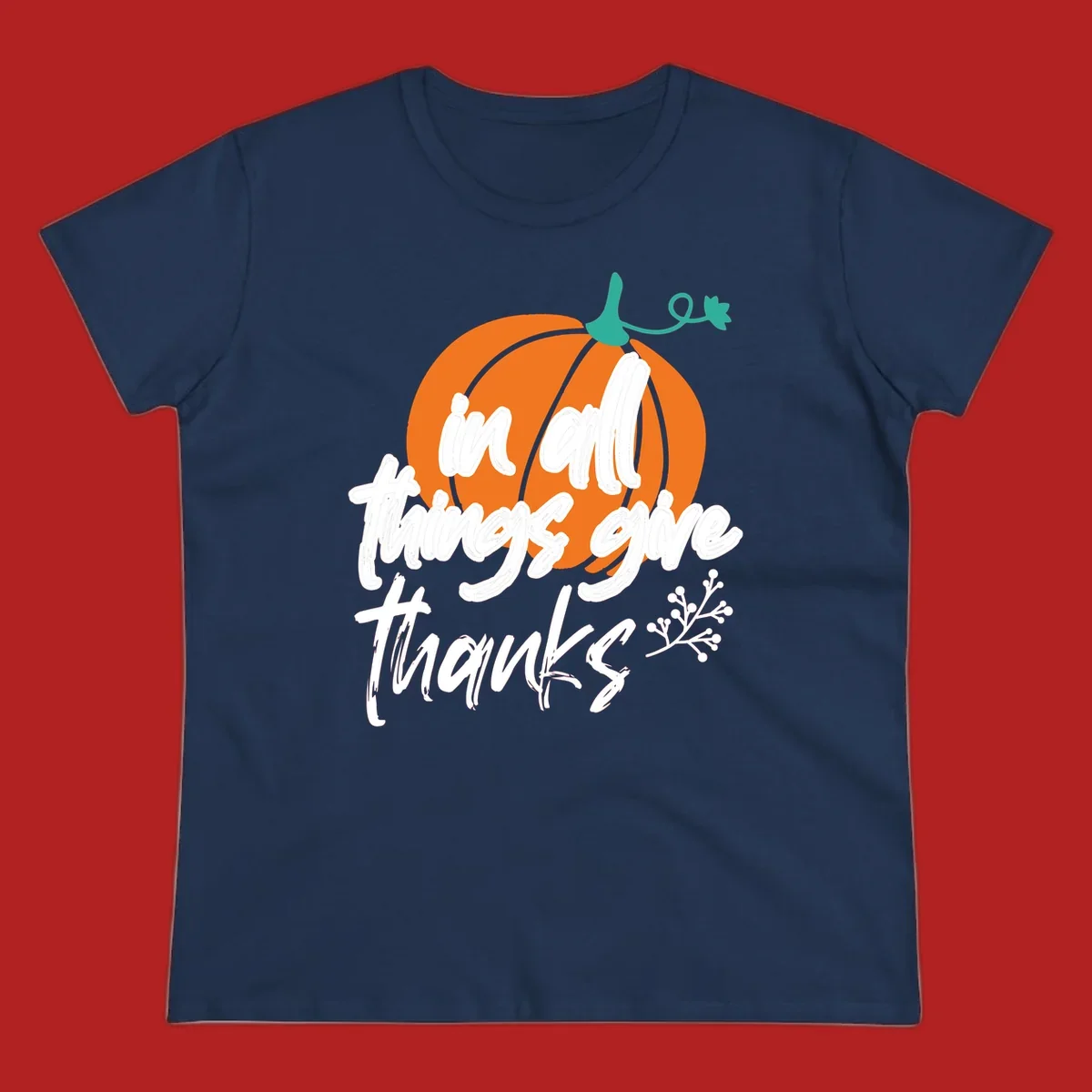 Thanksgiving pumpkin with 'in all things give thanks' text, autumn holiday design.