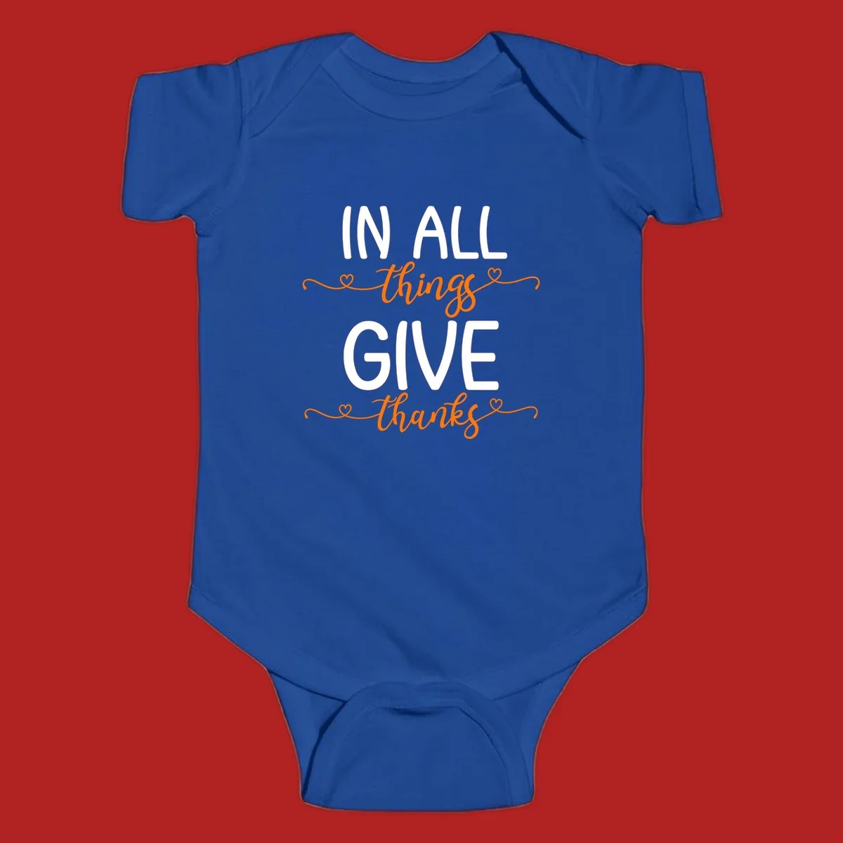 In all things give thanks phrase with script font and heart accents.