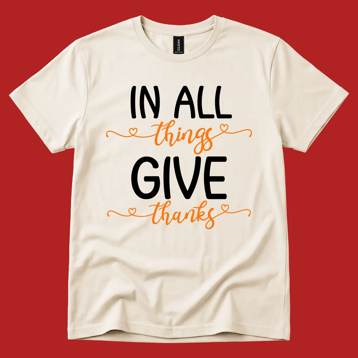 In all things give thanks phrase with script font and heart accents.