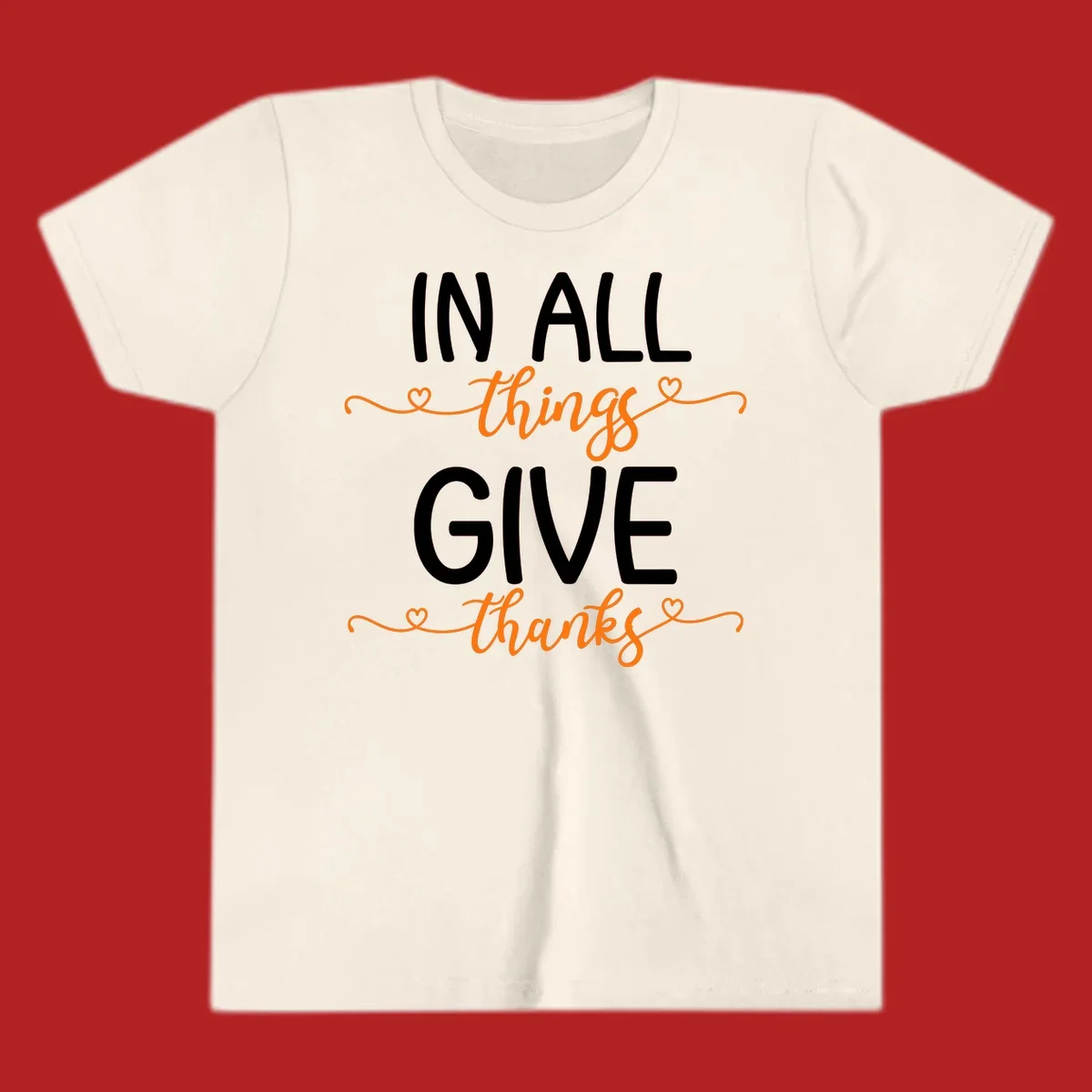 In all things give thanks phrase with script font and heart accents.