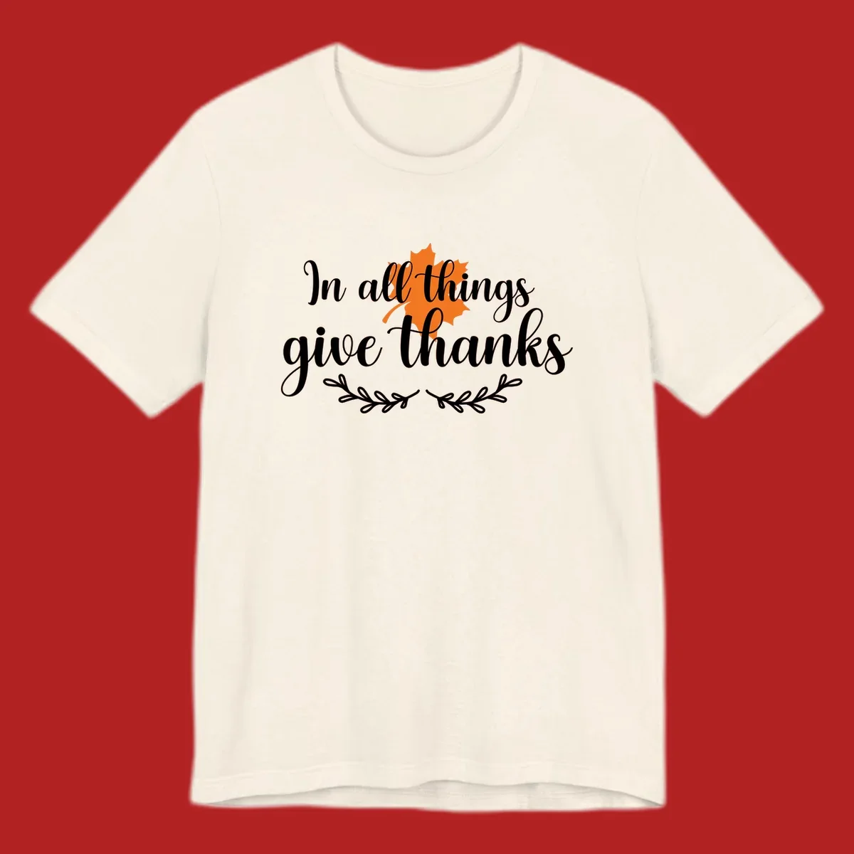 Thanksgiving typography with orange maple leaf and 'In all things give thanks' text.