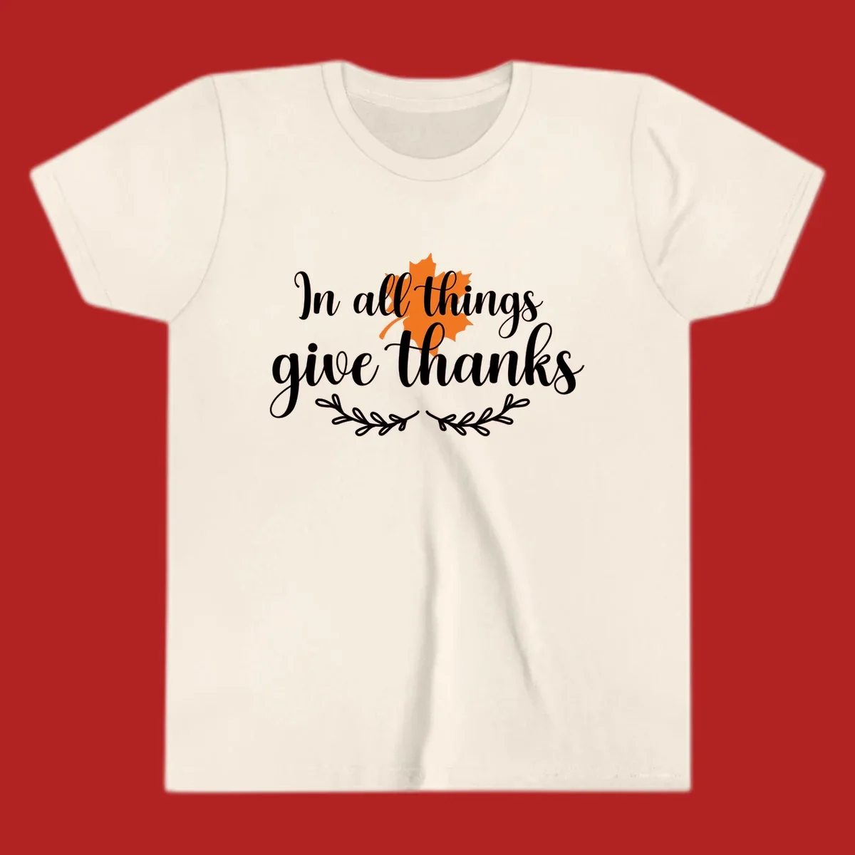 Thanksgiving typography with orange maple leaf and 'In all things give thanks' text.