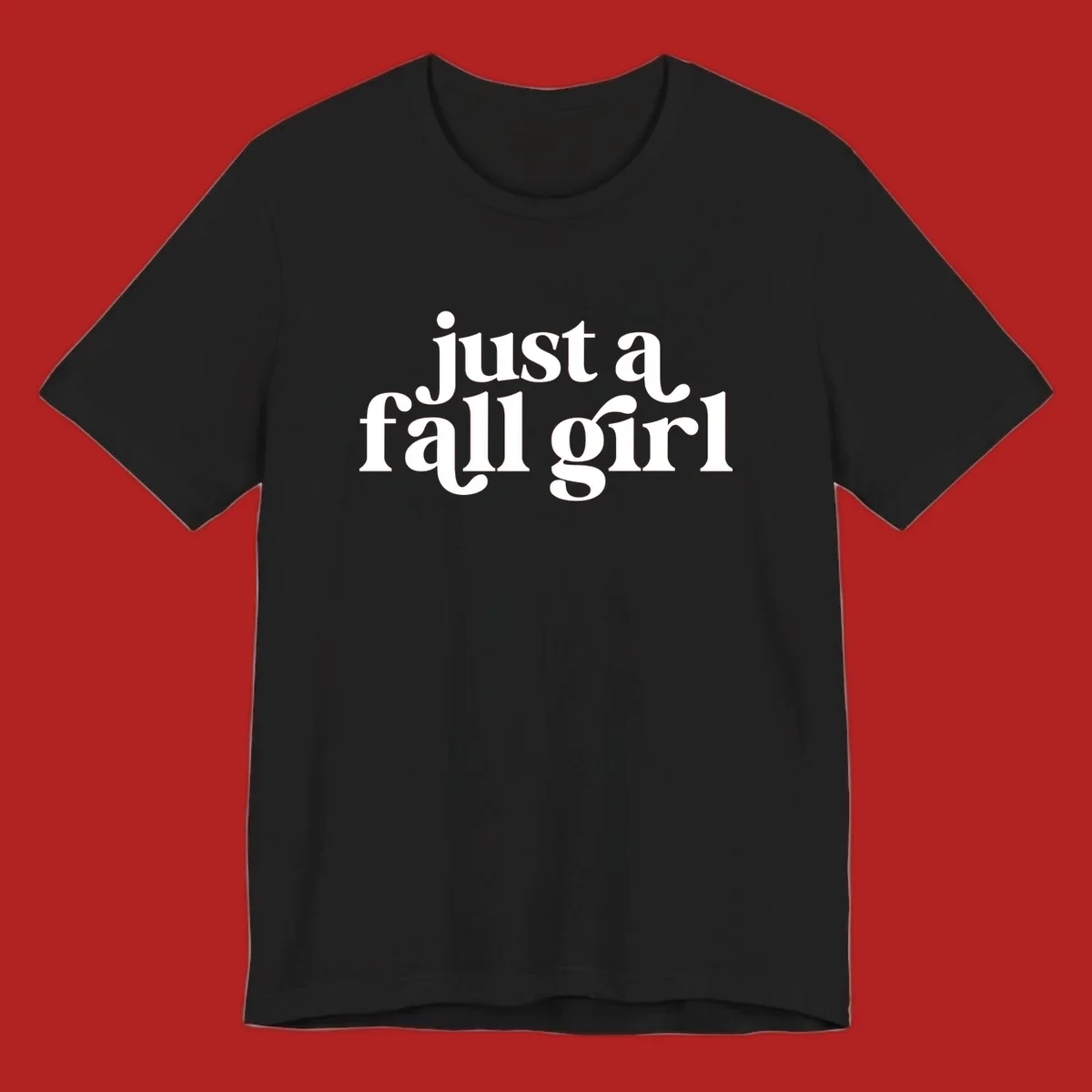 Just a Fall Girl typography design in white.