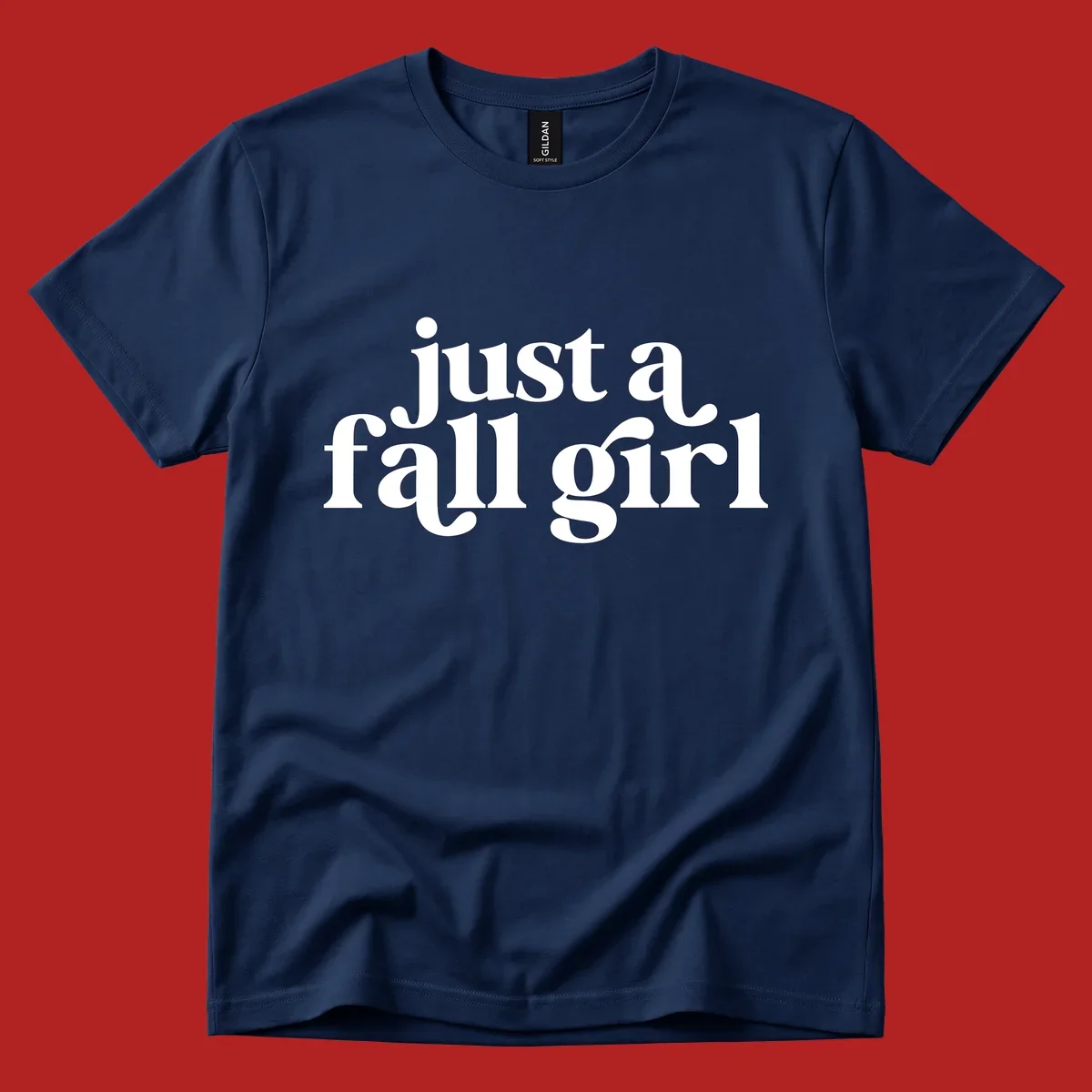 Just a Fall Girl typography design in white.