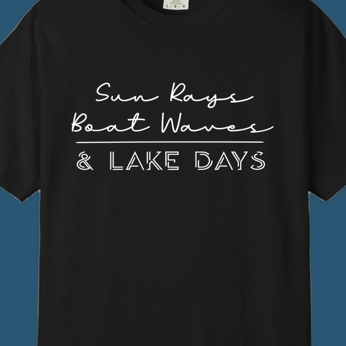 Lake days design with sun rays, boat waves, and '& LAKE DAYS' text.