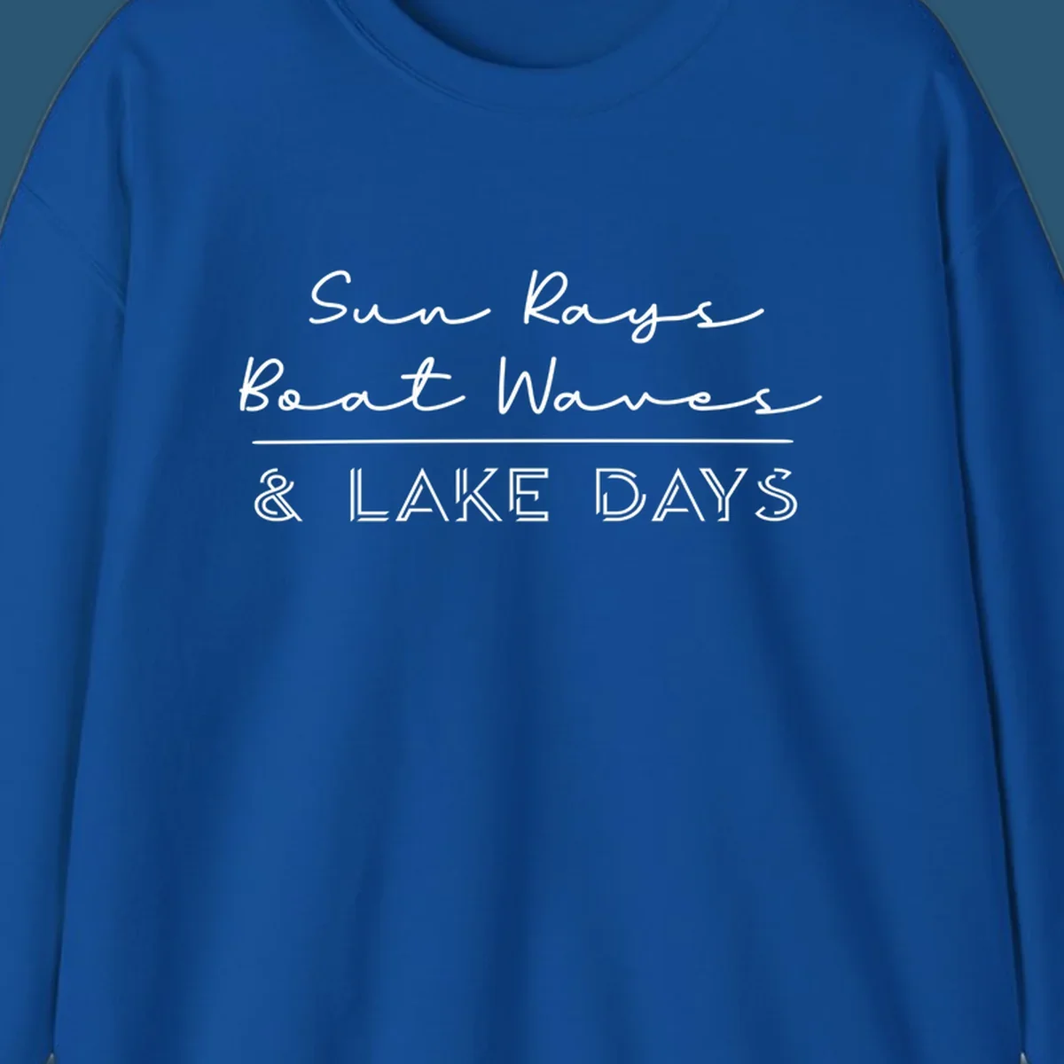 Lake days design with sun rays, boat waves, and '& LAKE DAYS' text.