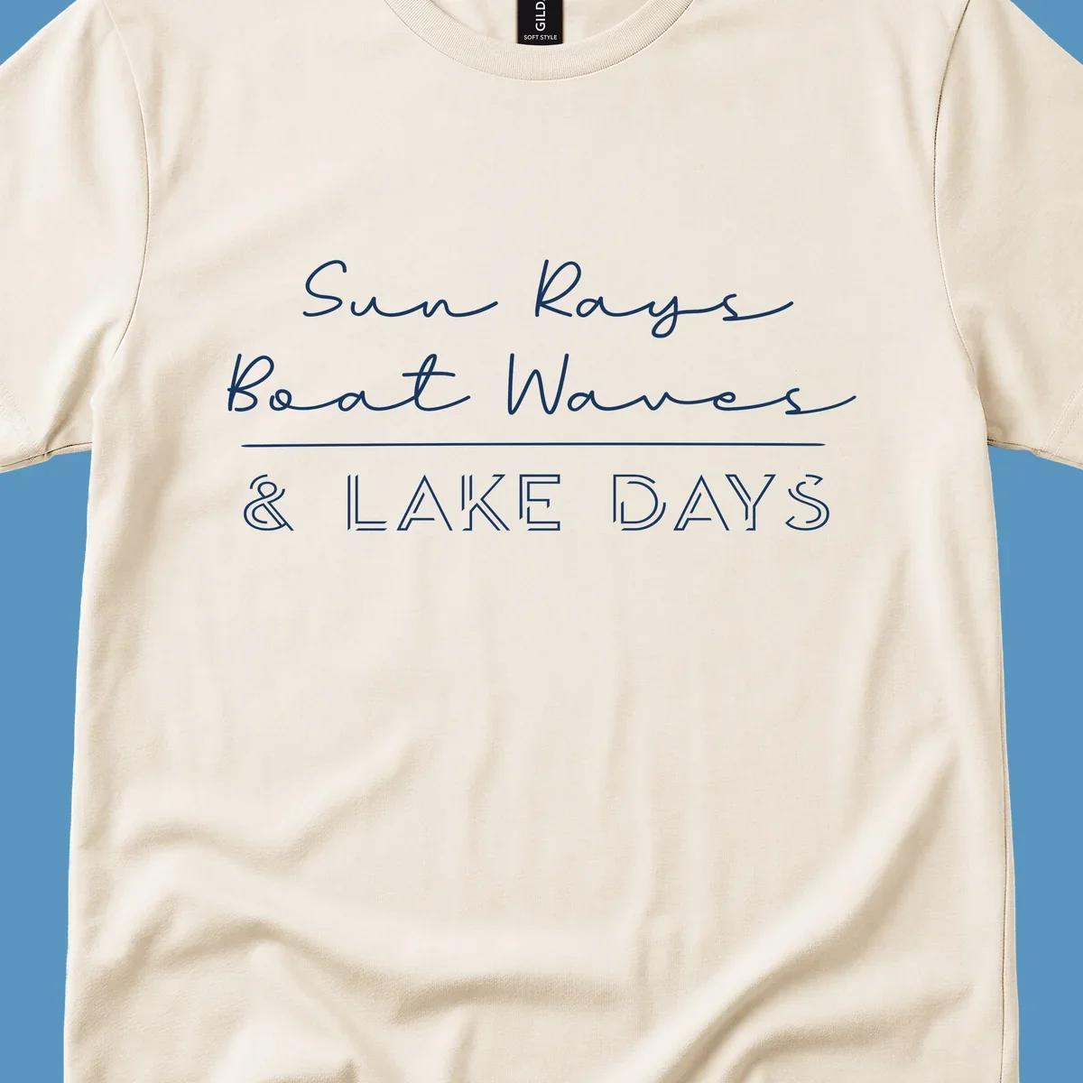 Lake days design with sun rays, boat waves, and '& LAKE DAYS' text.