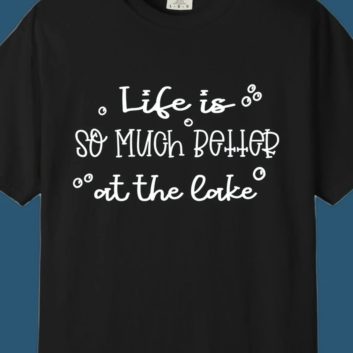 Typography design that reads 'Life is so much better at the lake' with bubble accents, lake-life-better.