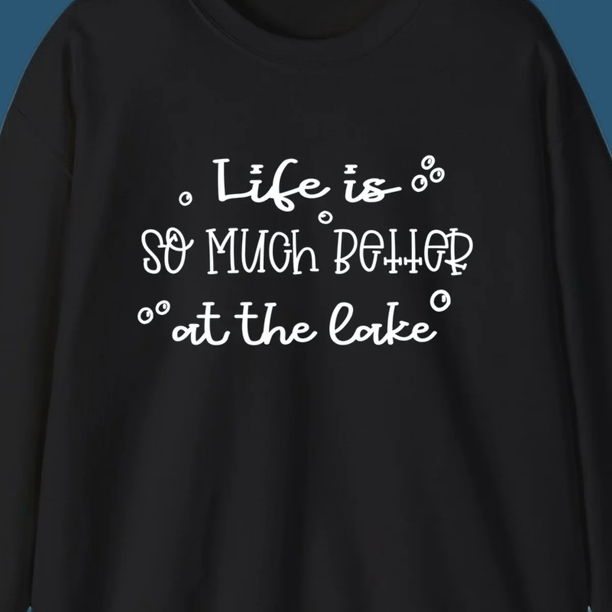 Typography design that reads 'Life is so much better at the lake' with bubble accents, lake-life-better.