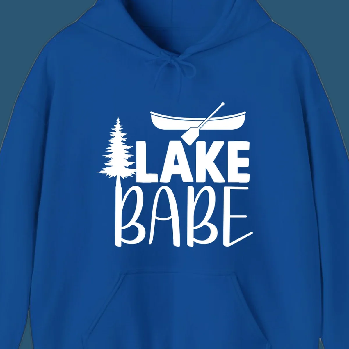Lake Babe design with canoe, pine tree, and text. Lake-babe-style graphic.