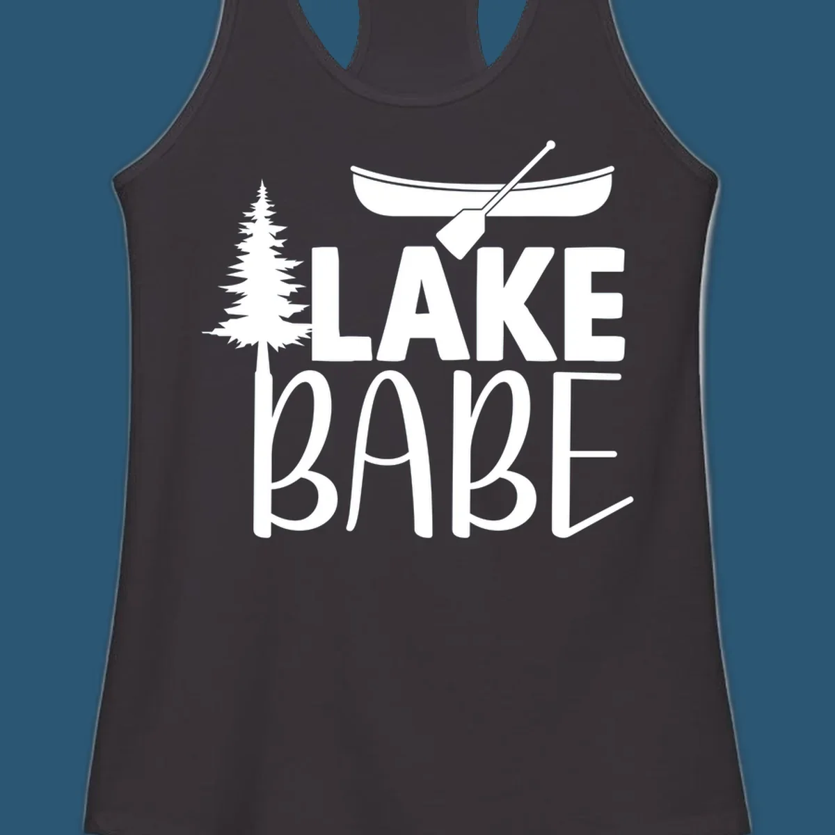 Lake Babe design with canoe, pine tree, and text. Lake-babe-style graphic.