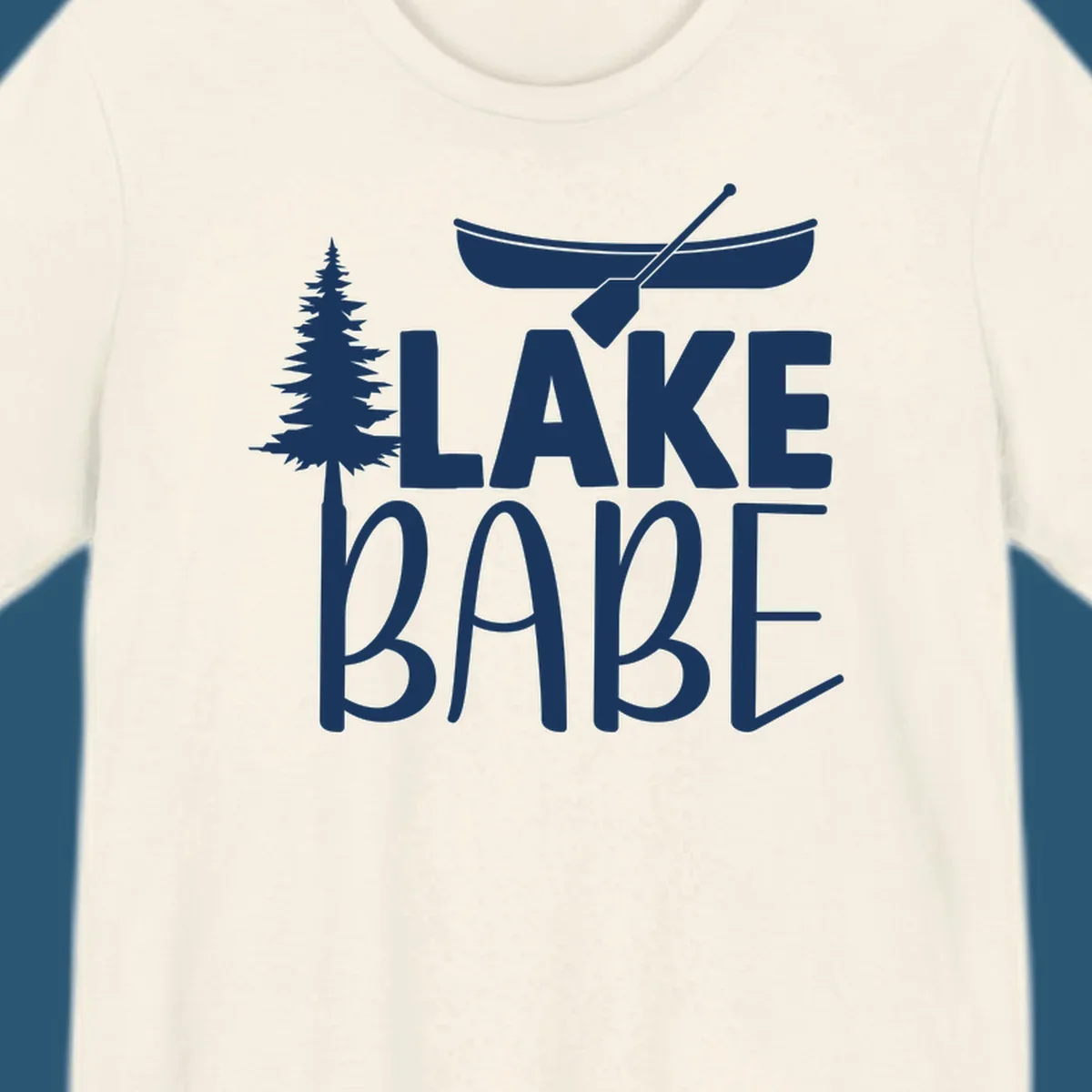 Lake Babe design with canoe, pine tree, and text. Lake-babe-style graphic.