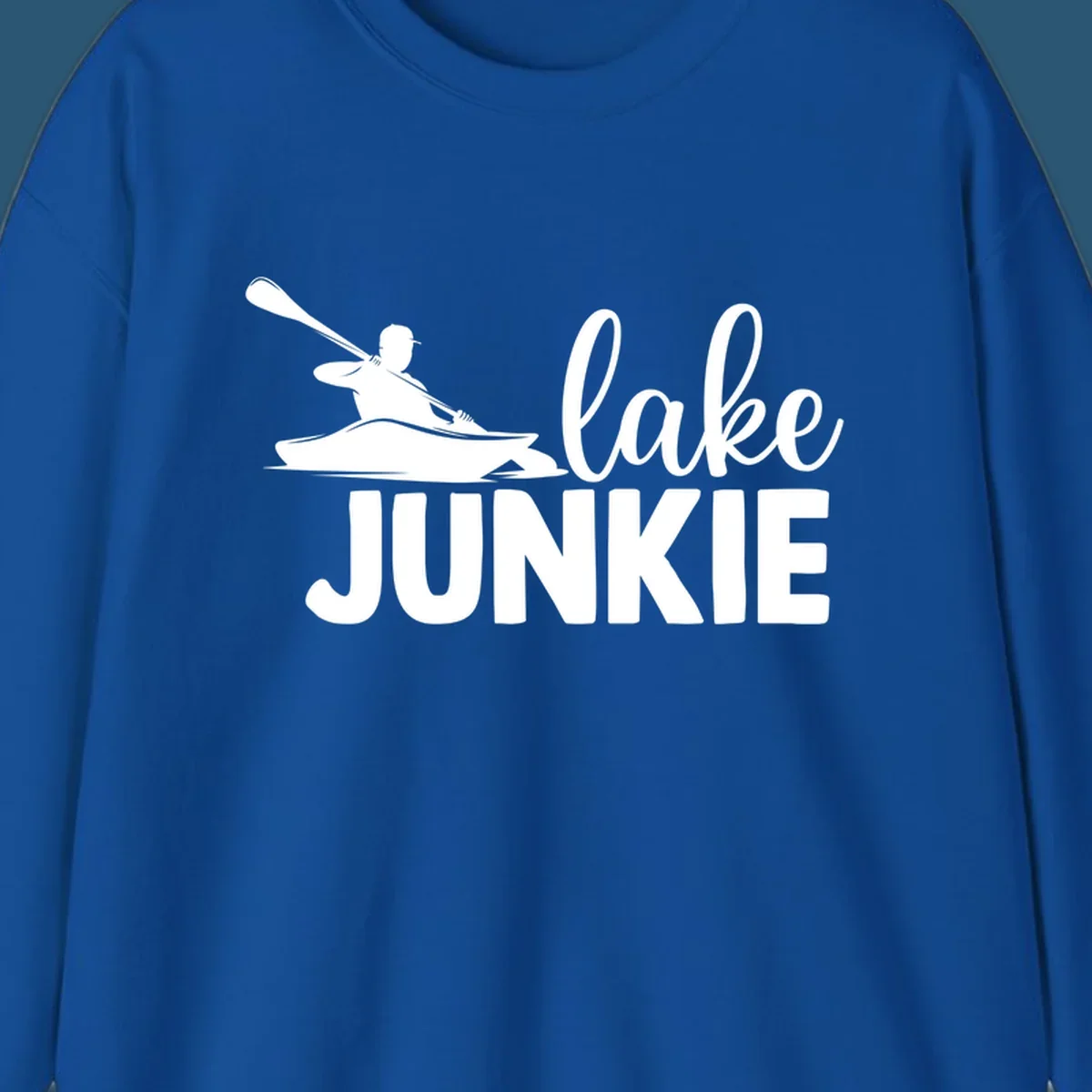 Lake junkie kayak silhouette design with script and block text. lake-junkie-kayak.