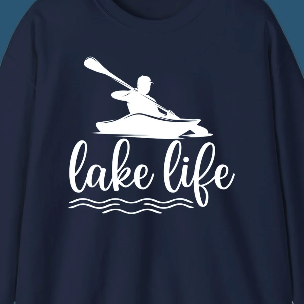 Silhouette of a person kayaking with paddle and 'lake life' text, representing lake-life-kayaking.
