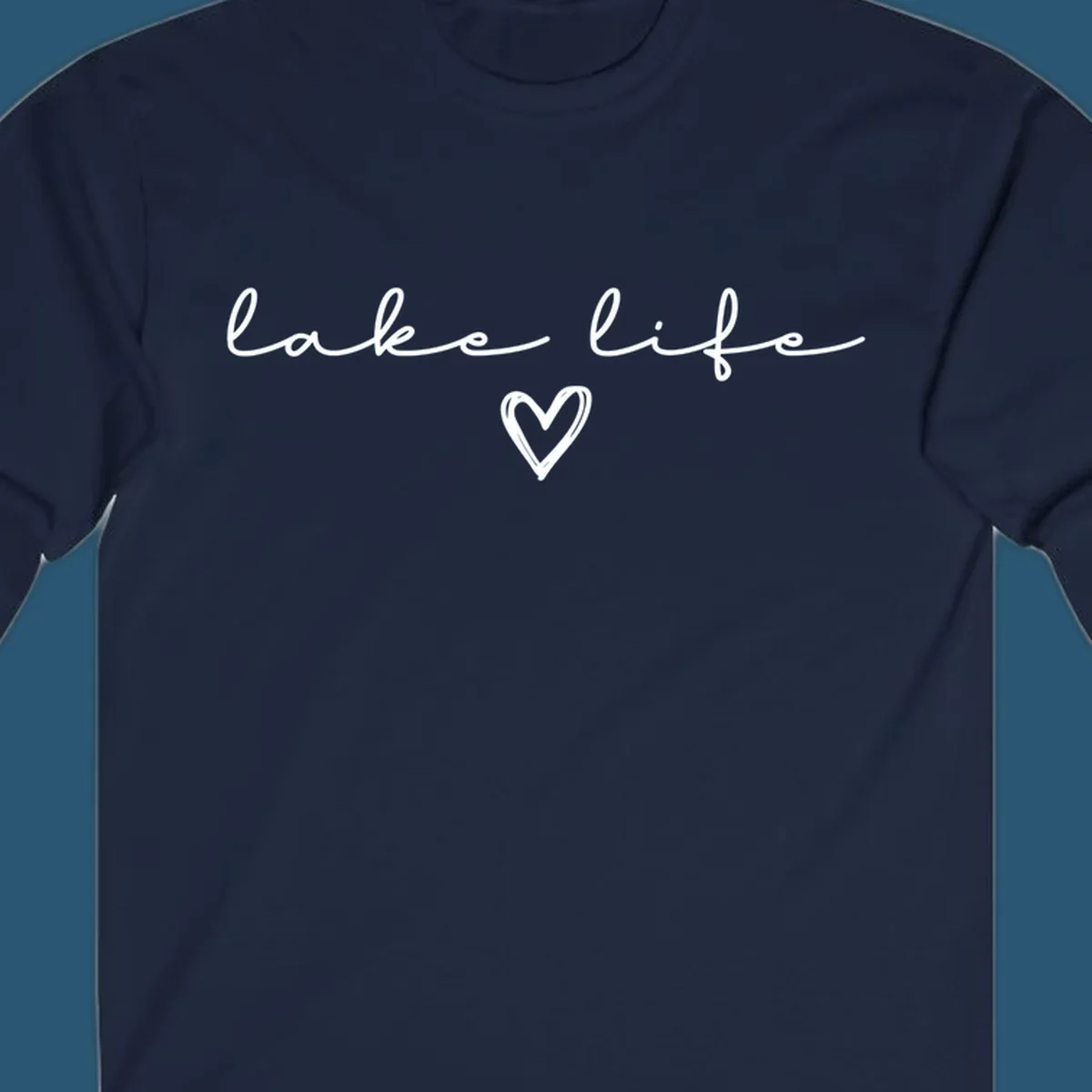 Lake life text with a heart graphic, in white and navy.