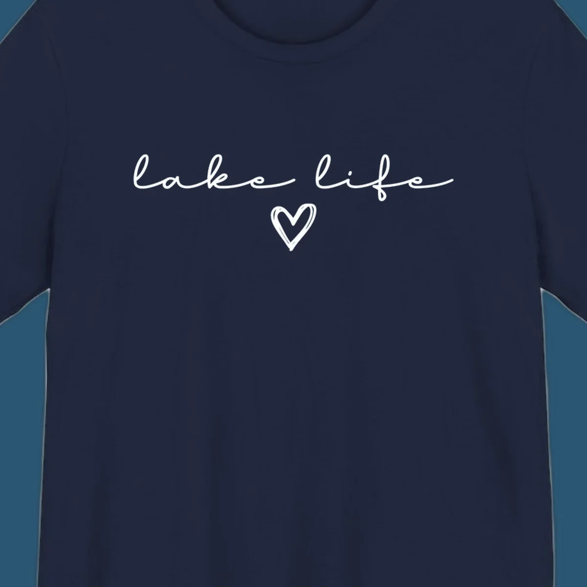 Lake life text with a heart graphic, in white and navy.