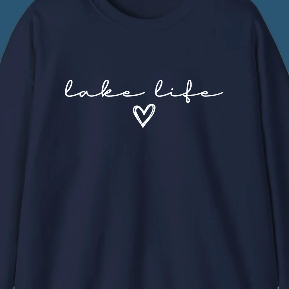 Lake life text with a heart graphic, in white and navy.