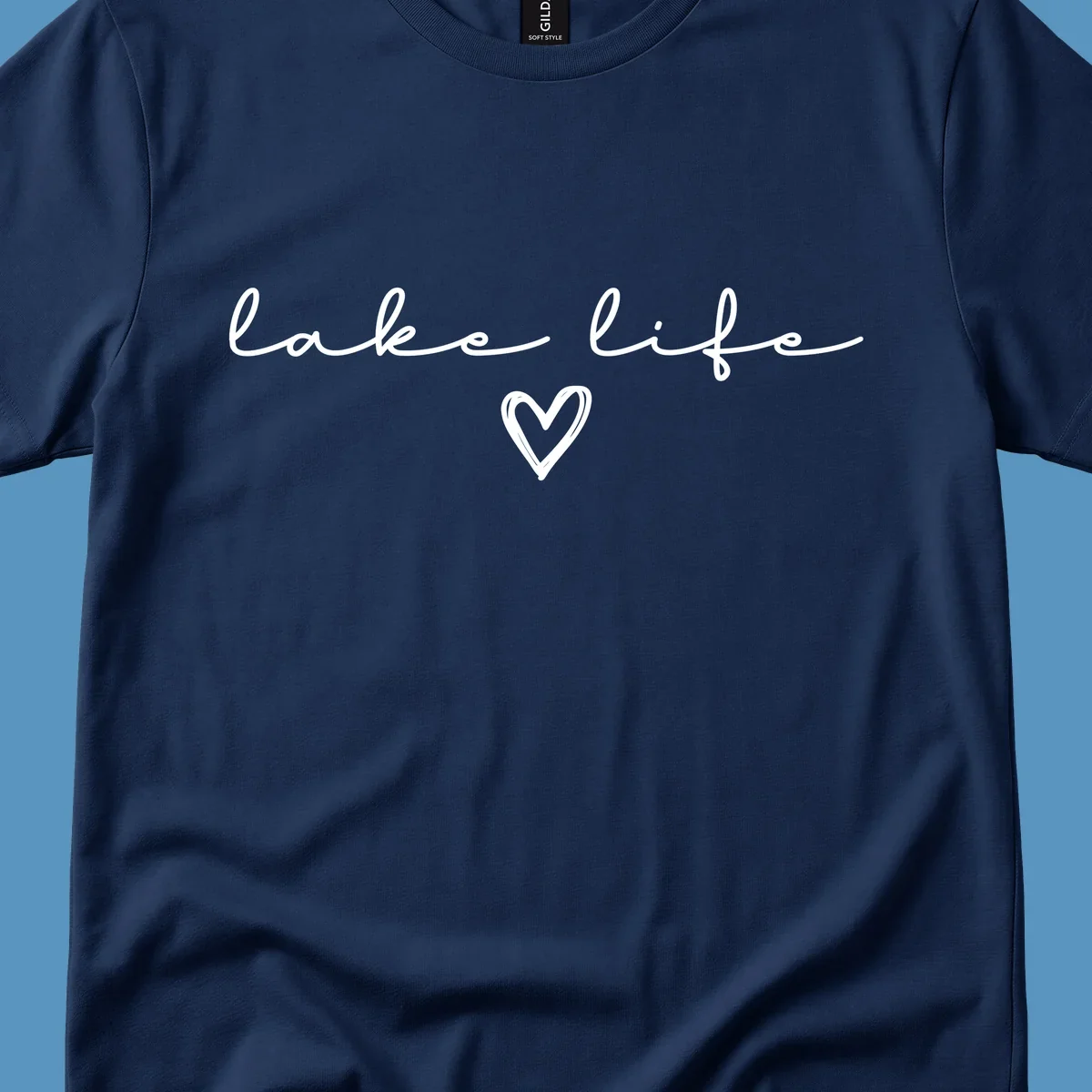 Lake life text with a heart graphic, in white and navy.