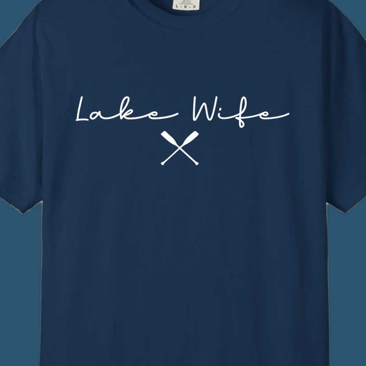 Lake Wife text with crossed oars nautical design.
