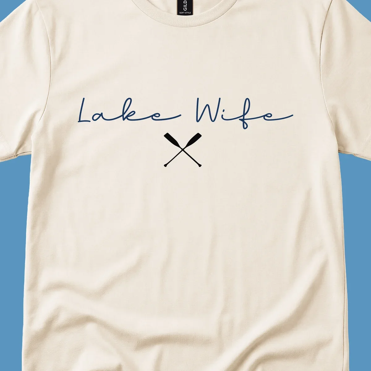 Lake Wife text with crossed oars nautical design.