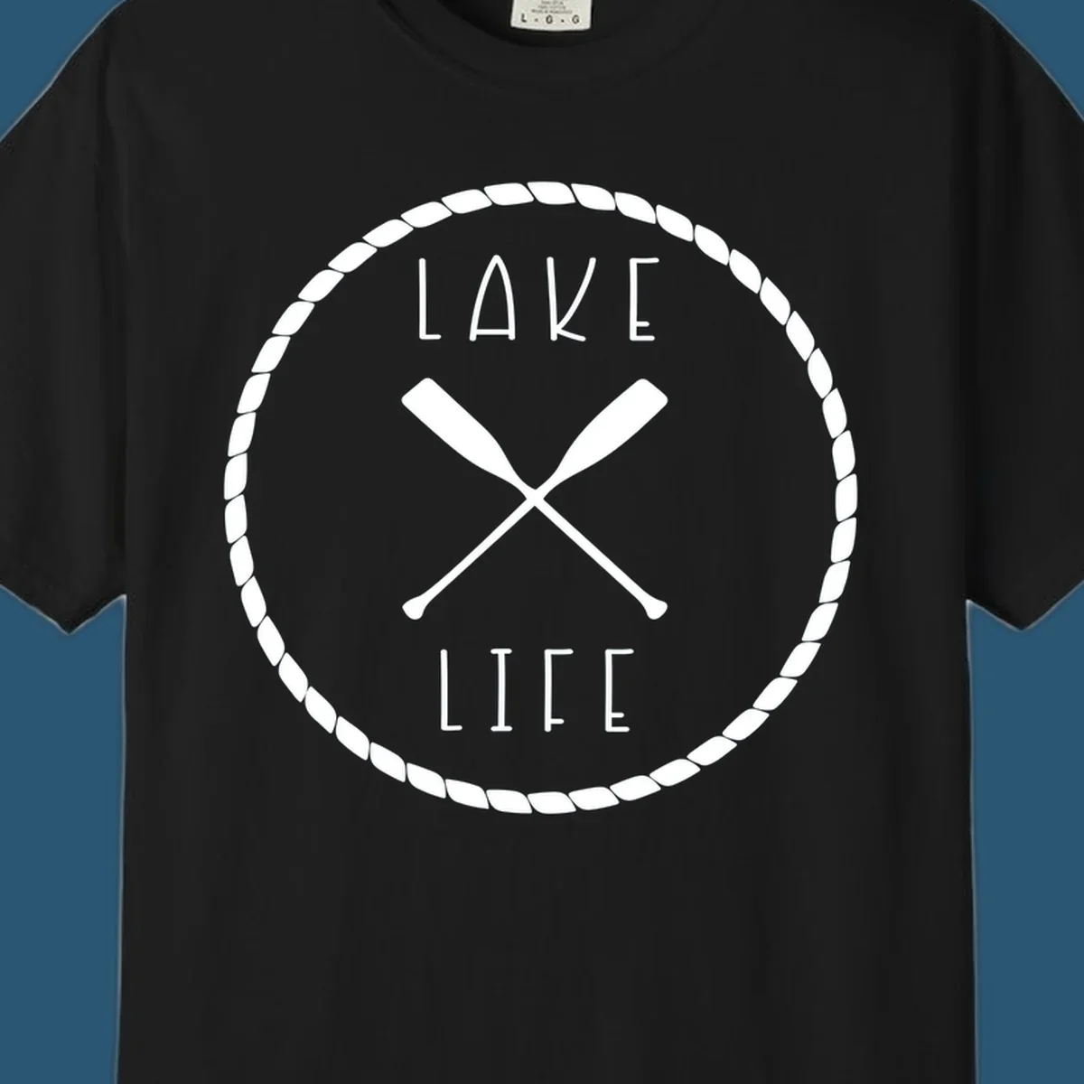 Lake life badge with crossed oars, rope border, and text 'LAKE LIFE'.