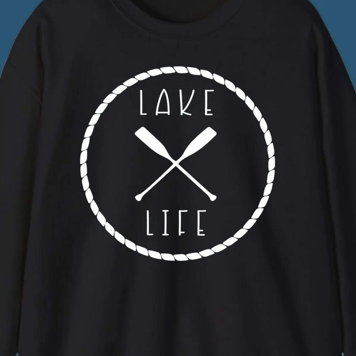 Lake life badge with crossed oars, rope border, and text 'LAKE LIFE'.