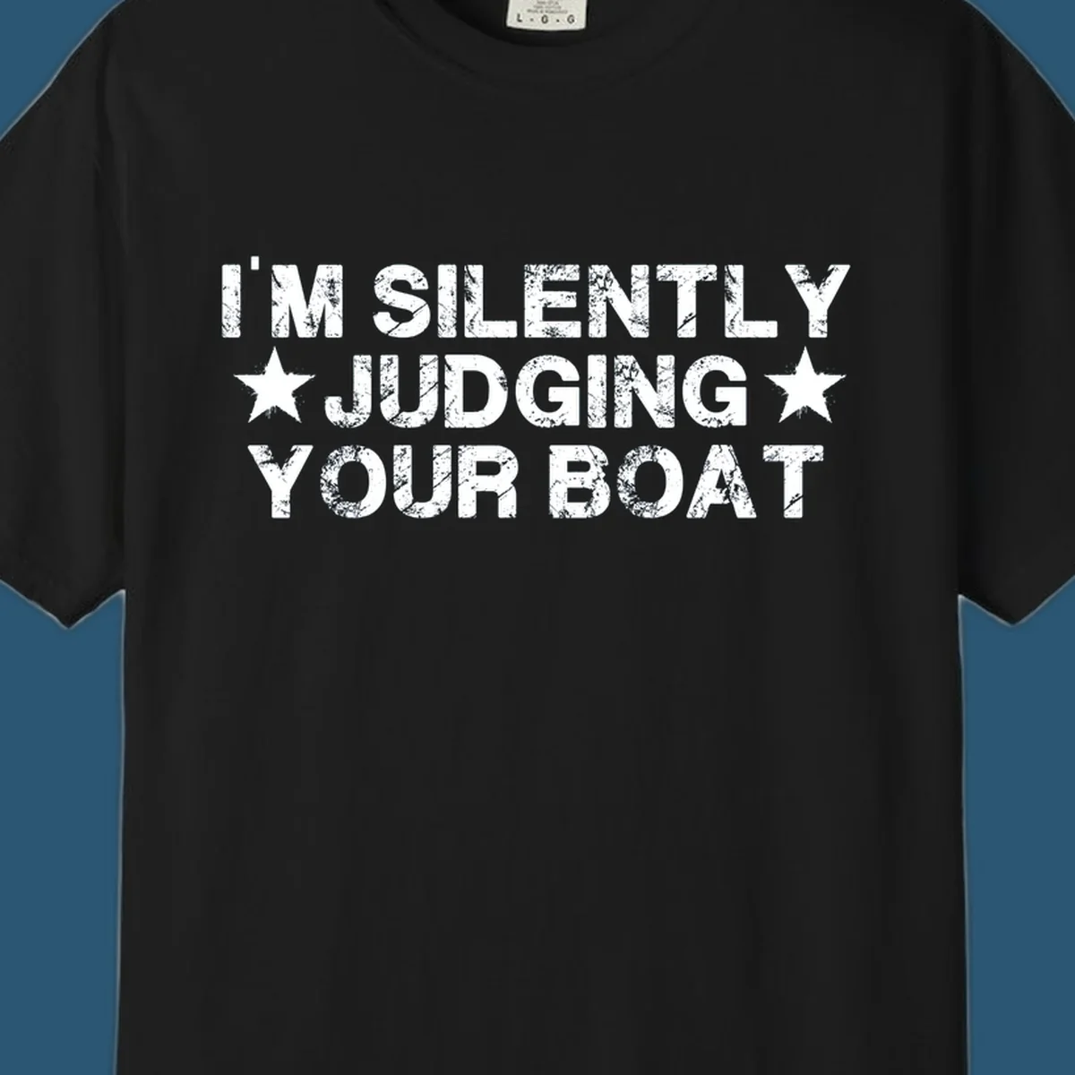 I'm Silently Judging Your Boat text design with distressed font and stars.
