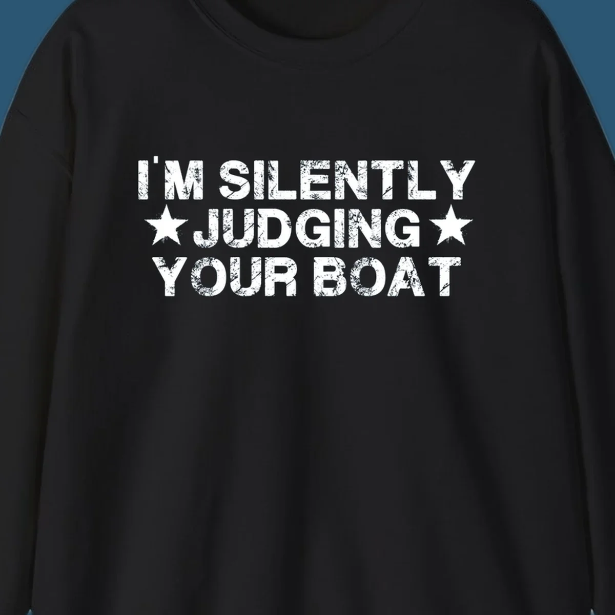 I'm Silently Judging Your Boat text design with distressed font and stars.
