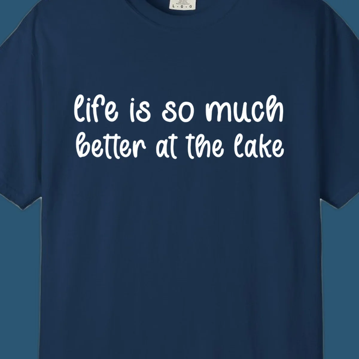 Typography design with the phrase "life is so much better at the lake" in a casual script font.