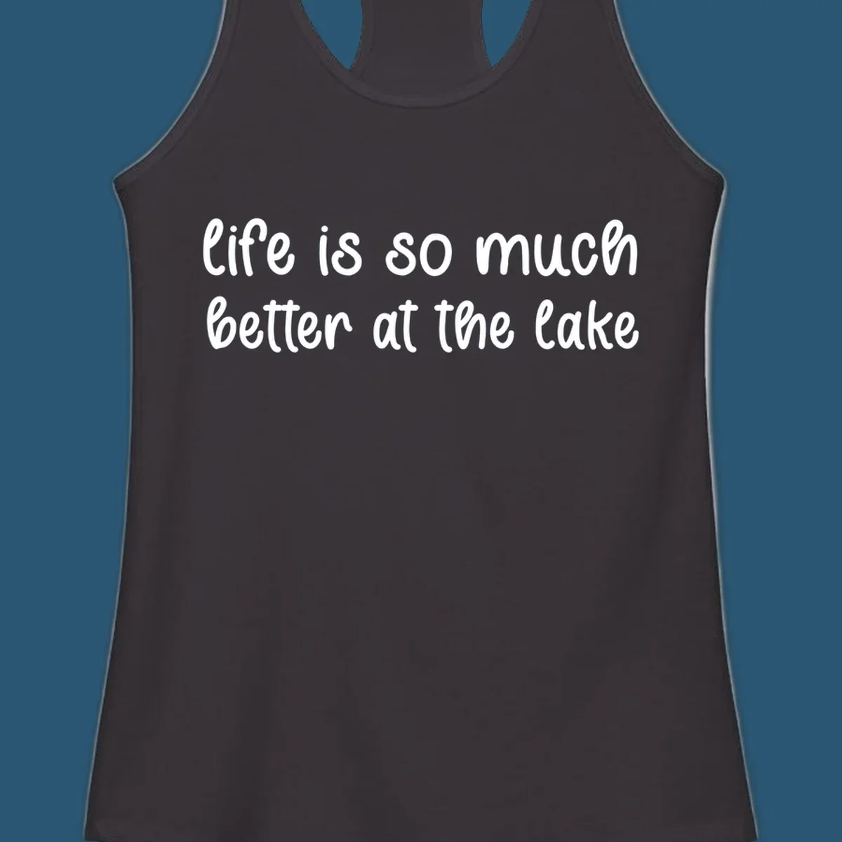 Typography design with the phrase "life is so much better at the lake" in a casual script font.