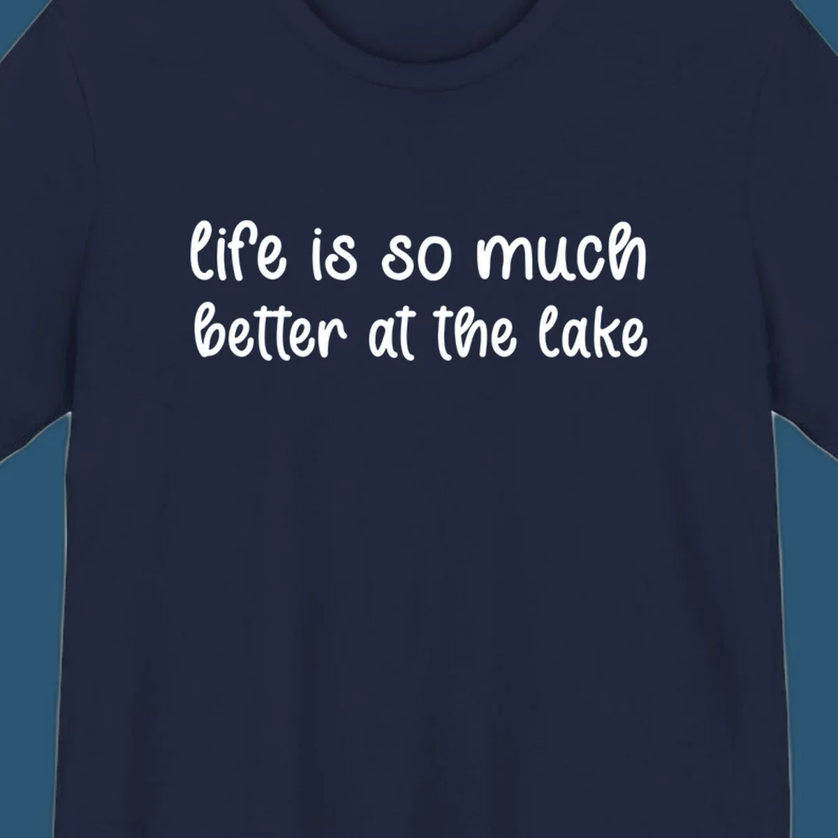 Typography design with the phrase "life is so much better at the lake" in a casual script font.