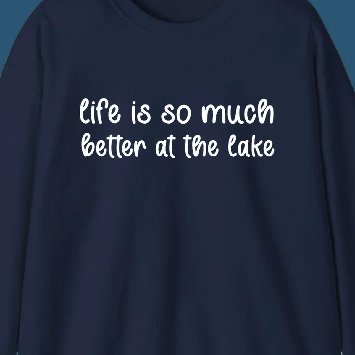 Typography design with the phrase "life is so much better at the lake" in a casual script font.