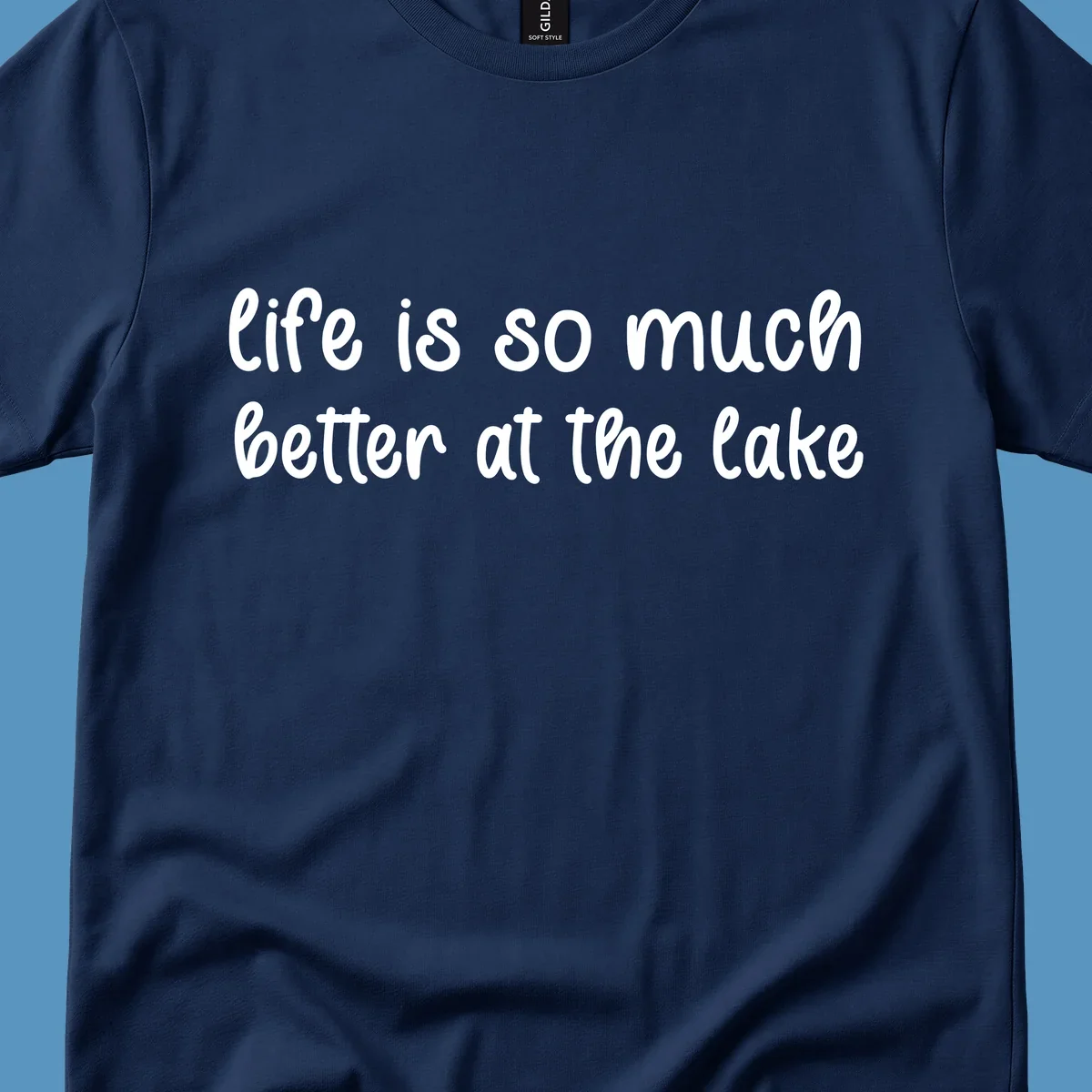 Typography design with the phrase "life is so much better at the lake" in a casual script font.
